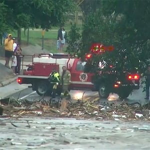 First responders survey rising flood waters of the Guadalupe River after flash flooding in Kerr County, Texas, U.S. July 4, 2025