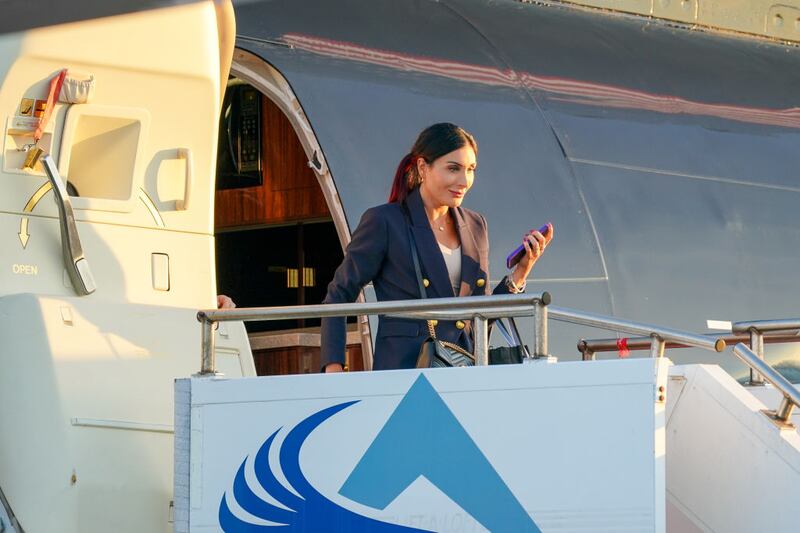 Laura Loomer strides off Donald Trump’s plane ahead of the ABC News Presidential Debate in September.
