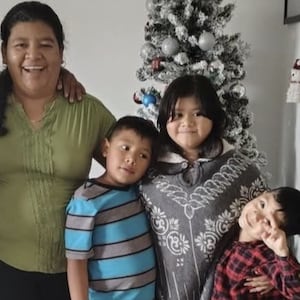 Denisse Parra Vargas with her children.