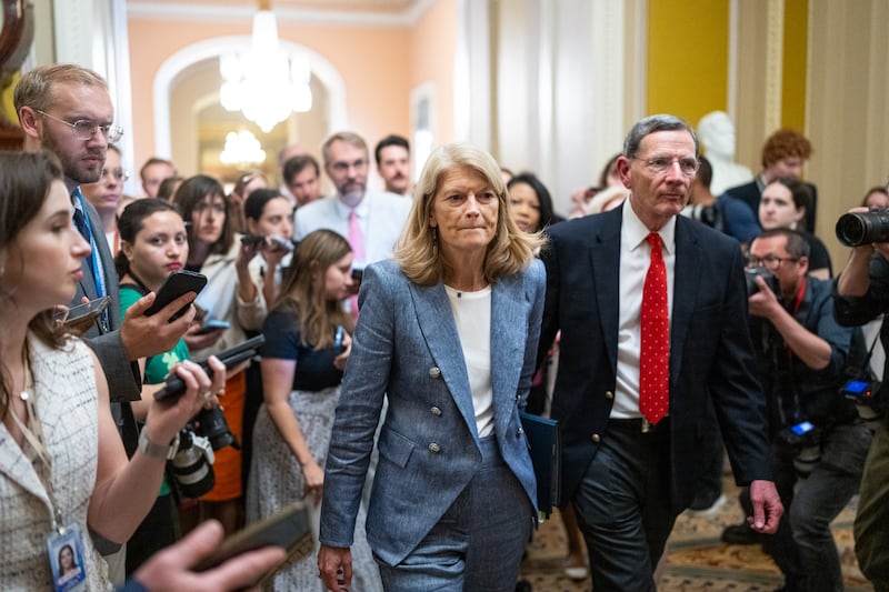 Alaska Sen. Lisa Murkowski, pictured on July 1 with Majority Whip John Barrasso, was the top target GOP Senate leaders worked on in an effort to get her to vote for the bill in the final hours before the vote after she expressed concerns.