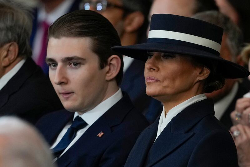 Barron Trump (L) and Melania Trump (R)