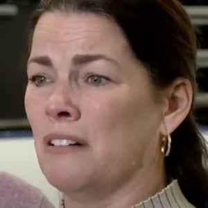 close up of Nancy Kerrigan looks tearfully onwards