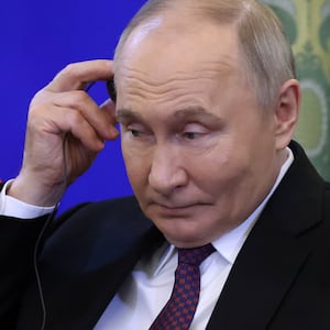 MOSCOW, RUSSIA - MAY 28: (RUSSIA OUT) Russian President Vladimir Putin touches his earphone during a Russian-Yemeni meeting at the Kremlin on May 28, 2025 in Moscow, Russia. President of Yemen Rashad al-Alimi began an official visit to Russia on Tuesday. (Photo by Contributor/Getty Images)