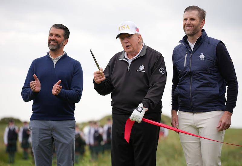 President Donald Trump with his sons Don Jr. and Eric at a ribbon-cutting ceremony for his golf course in Aberdeen, Scotland on July 29, 2025.