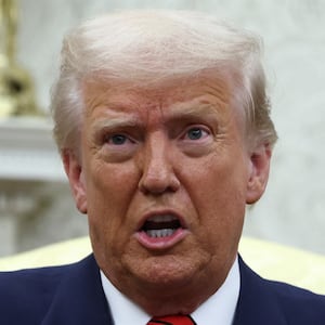 U.S. President Donald Trump reacts as he meets NATO Secretary General Mark Rutte (not pictured), in the Oval Office at the White House in Washington, D.C., U.S., March 13, 2025.