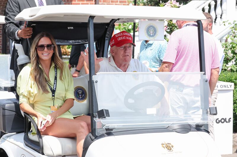 Donald Trump and Margo Martin at Trump National Bedminster.