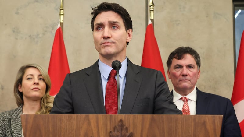 Canada's Prime Minister Justin Trudeau is joined by Finance Minister Dominic LeBlanc, Minister of Foreign Affairs Melanie Joly, and Minister of Public Safety David McGuinty, as he speaks during a press conference while responding to U.S. President Donald Trump's orders to impose 25% tariffs on Canadian imports, in Ottawa, Ontario, Canada February 1, 2025. REUTERS/Patrick Doyle