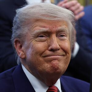 Trump holding a signed executive order—he demanded action on the Smithsonian’s allegedly “improper” ideology in March.