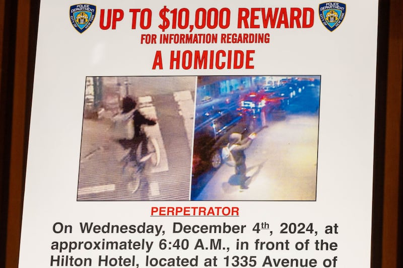 A wanted poster for the suspect believed to have killed UnitedHealthcare CEO Brian Thompson.