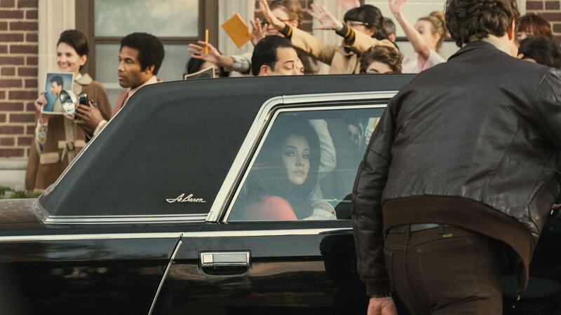 A photo including a film still from the film Priscilla