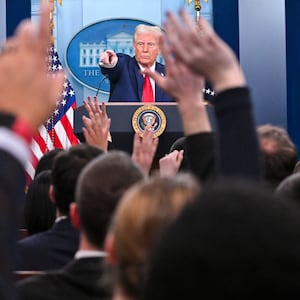 Donald Trump takes questions from the press.