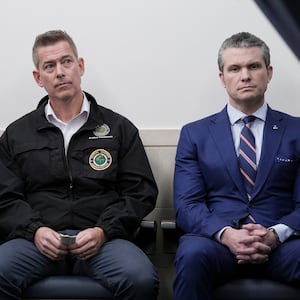(L-R) US Vice President JD Vance, Transportation Secretary Sean Duffy, and Secretary of Defense nominee Pete Hegseth look on as US President Donald Trump speaks about the mid-air crash between American Airlines flight 5342 and a military helicopter in Washington, in the Brady Press Briefing Room at the White House on January 30, 2025 in Washington, DC. Divers pulled bodies from the icy waters of Washington's Potomac river Thursday after a US military helicopter collided midair with a passenger plane carrying 64 people, with officials saying there were likely no survivors. (Photo by Oliver Contreras / AFP) (Photo by OLIVER CONTRERAS/AFP via Getty Images)