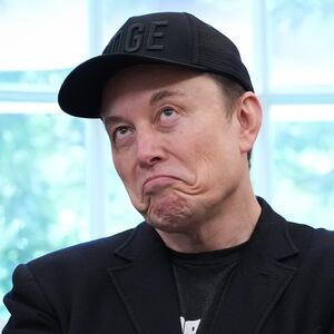 Tesla CEO Elon Musk speaks alongside U.S. President Donald Trump to reporters in the Oval Office of the White House on May 30, 2025 in Washington, DC. Musk, who served as an adviser to Trump and led the Department of Government Efficiency, announced he would leave his role in the Trump administration to refocus on his businesses.