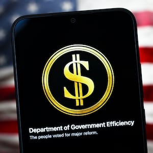 CANADA - 2025/02/07: In this photo illustration, the United States Department of Government Efficiency (DOGE) logo is seen displayed on a smartphone screen. (Photo Illustration by Thomas Fuller/SOPA Images/LightRocket via Getty Images)