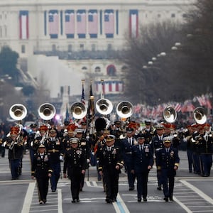FILE PHOTO: The U.S. Army band "Pershing's Own" marches in the parade carrying U.S. President Donald Trump following his inauguration in Washington, U.S., January 20, 2017.      REUTERS/Joshua Roberts/File Photo