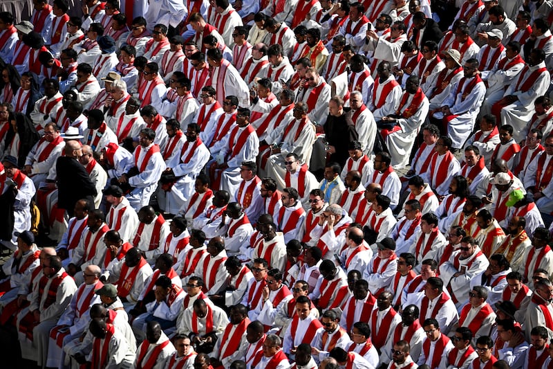 Members of the clergy gather, ahead of the funeral Mass of Pope Francis in St. Peter's Square at the Vatican, April 26, 2025.