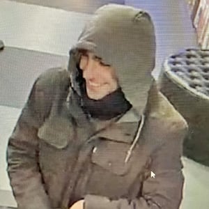 The suspect in the killing of UnitedHealthcare CEO Brian Thompson used a fake ID to check into a local hostel, where he allegedly got flirty with a front desk attendant, which led him to be captured on security footage.