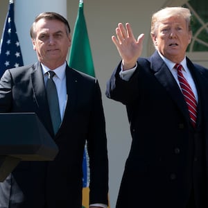 Jair Bolsonaro says he’s attempting to get his passport back to attend Donald Trump’s inauguration.