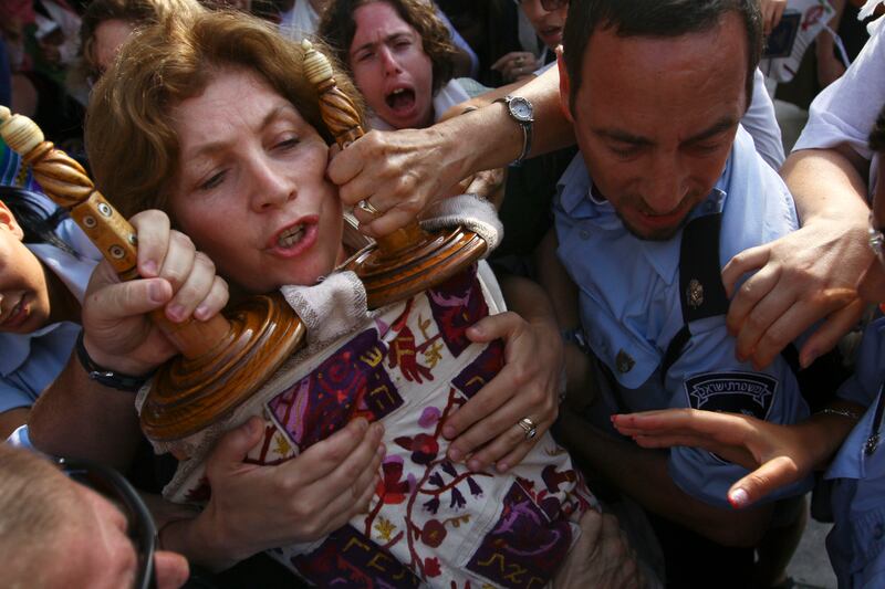 articles/2013/02/06/natan-sharansky-mediates-jerusalem-s-western-wall-dispute/130205-ephron-wall-women-embed2_woqzp2