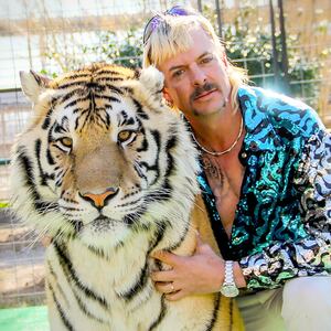 Tiger King Joe Exotic with a tiger
