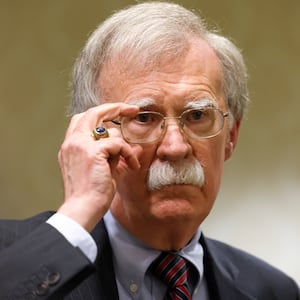 Former National Security Adviser John Bolton speaks to reporters after speaking in a panel hosted by the National Council of Resistance of Iran on August 17, 2022 in Washington, DC.
