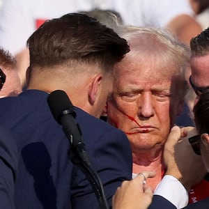Republican presidential candidate and former U.S. President Donald Trump is assisted by the Secret Service