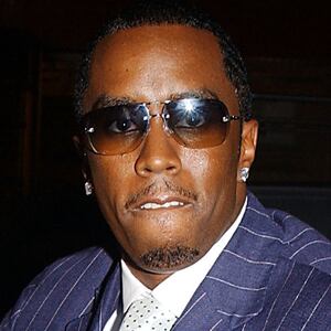 NEW YORK - JULY 2:  Musician Sean (P. Diddy) Combs arrives for his "Sean (P. Diddy) Combs Bad Boy Entertainment Party" at Eugene's on July 2, 2002 in New York City. Sean (P.Diddy) Combs has just sealed a deal which gives him full control of the Bad Boy Entertainment Empire, including the entire artist roster and past and present catalogue.  (Photo by Mark Mainz/Getty Images)