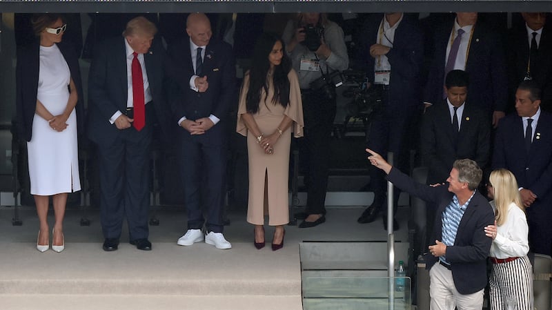 Donald Trump gives a thumbs up to Pam Bondi and her partner John Wakefield at the FIFA Club World Cup match between England's Chelsea and France's Paris Saint-Germain at the MetLife Stadium in East Rutherford, New Jersey.