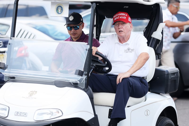 Donald Trump and Walt Nauta at Bedminster.
