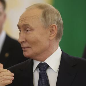 MOSCOW, RUSSIA - OCTOBER 8 (RUSSIA OUT) Russian President Vladimir Putin (R) talks to Presidential Press Secretary Dmitry Peskov during the Summit of the Commonwealth of Independent States (CIS), October 8, 2024, in Moscow, Russia. Leaders of ex-Soviet states gathered for an annual summit of CIS. (Photo by Contributor/Getty Images)