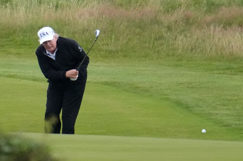 Donald Trump playing golf in Scotland