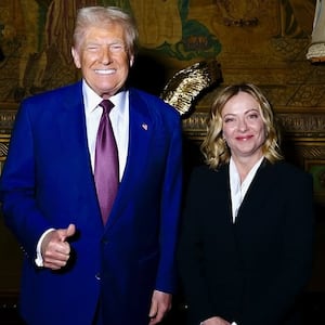 President-elect Donald Trump and Italian Prime Minister Giorgia Meloni pose together at his Mar-a-Lago estate in Palm Beach, Florida.