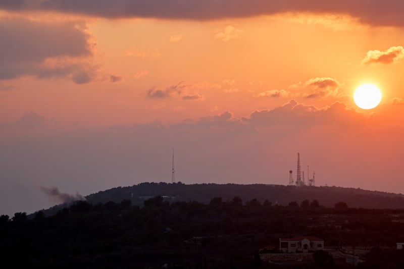 A photo of smoke rising after Israeli shelling, as seen from the Lebanese side, near the border with Israel, in Alma Al-Shaab, southern Lebanon, October 13, 2023.