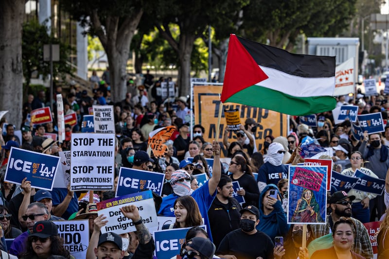 Los Angeles, CA - June 06: Demonstrators protest outside the Edward R. Roybal Federal Building and the Metropolitan Detention Center in response to ICE raids in Los Angeles on Friday, June 6, 2025 in Los Angeles, CA. (Jason Armond / Los Angeles Times via Getty Images)