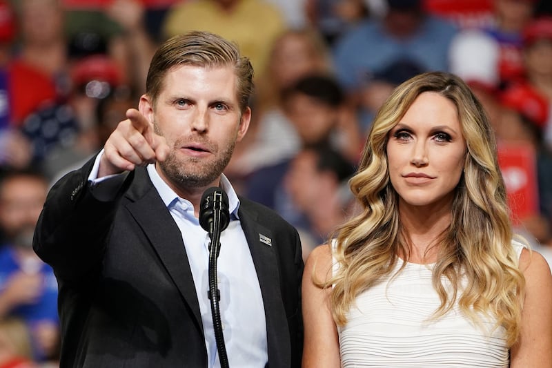 Eric Trump (L) and Lara Trump (R)