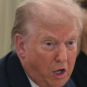 WASHINGTON, DC - SEPTEMBER 04: U.S. President Donald Trump speaks as first lady Melania Trump listens during a dinner at the State Dining Room of the White House on September 4, 2025 in Washington, DC. President Donald Trump hosted tech and business leaders for dinner after they joined first lady Melania Trump's meeting of the Artificial Intelligence (AI) Education Task Force at the White House this afternoon. (Photo by Alex Wong/Getty Images)