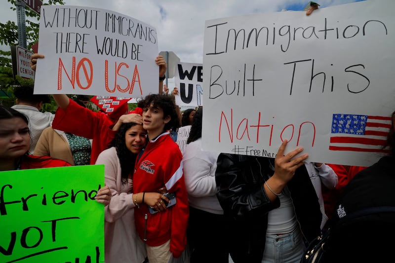 Relatives and members of the community participate in a rally in support of Marcelo Gomes on Sunday.
