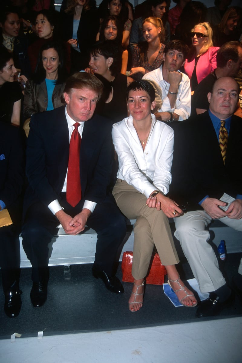 Donald Trump and Ghislaine Maxwell attend a fashion show in 2000 in New York City.