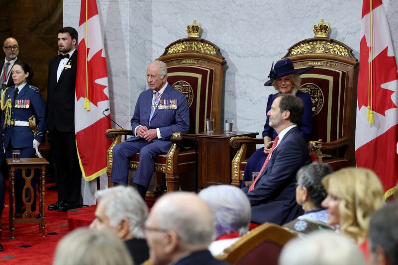 King Charles III and Queen Camilla sat on their thrones in Ottawa's Senate during an official visit to Canada Tuesday.