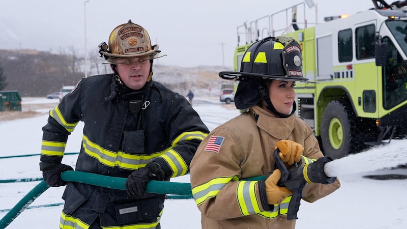 U.S. Department of Homeland Security Secretary Kristi Noem participates in a firefighting drill with a training helicopter during a tour of U.S. Coast Guard Air Station in Kodiak, Alaska, U.S., March 17, 2025.     Alex Brandon/Pool via REUTERS
