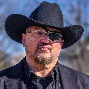Stewart Rhodes, wearing a cowboy hat and his eye patch, after a news conference at the US Capitol in February.