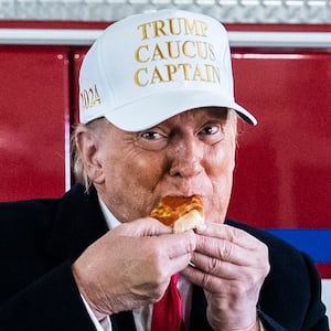 Donald Trump eats pizza