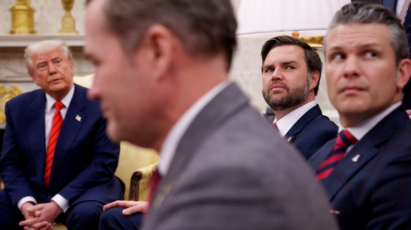 President Donald Trump, National Security Adviser Michael Waltz, Vice President J.D. Vance, and Defense Secretary Pete Hegseth during a meeting in the Oval Office.