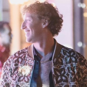 Mark Zuckerberg showed off a deeply unbuttoned shirt at his disco-themed bash.