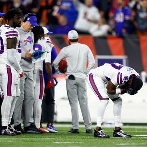 TreDavious White #27 of the Buffalo Bills reacts to an injury sustained by Damar Hamlin #3 during the first quarter of an NFL football game against the Cincinnati Bengals.