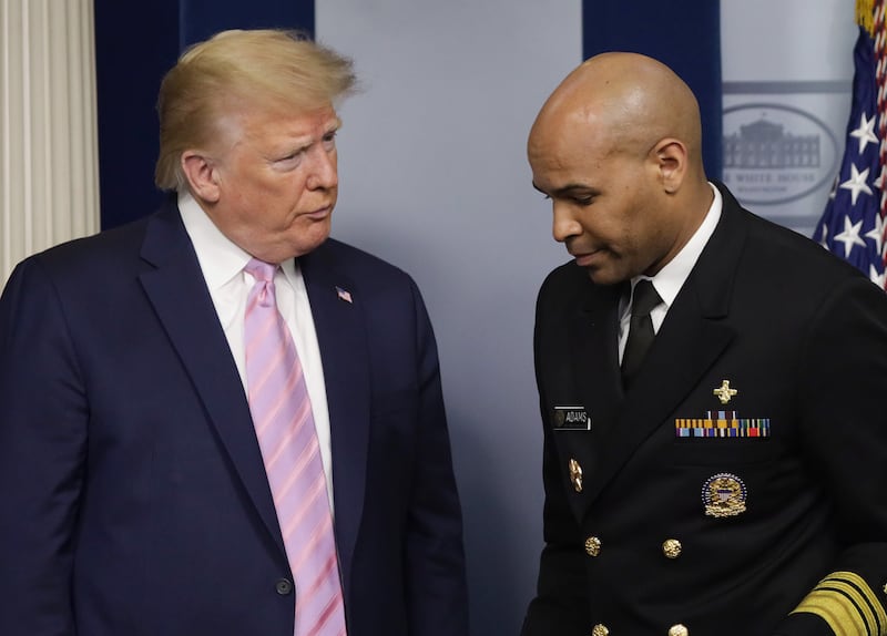 Donald Trump and Jerome Adams
