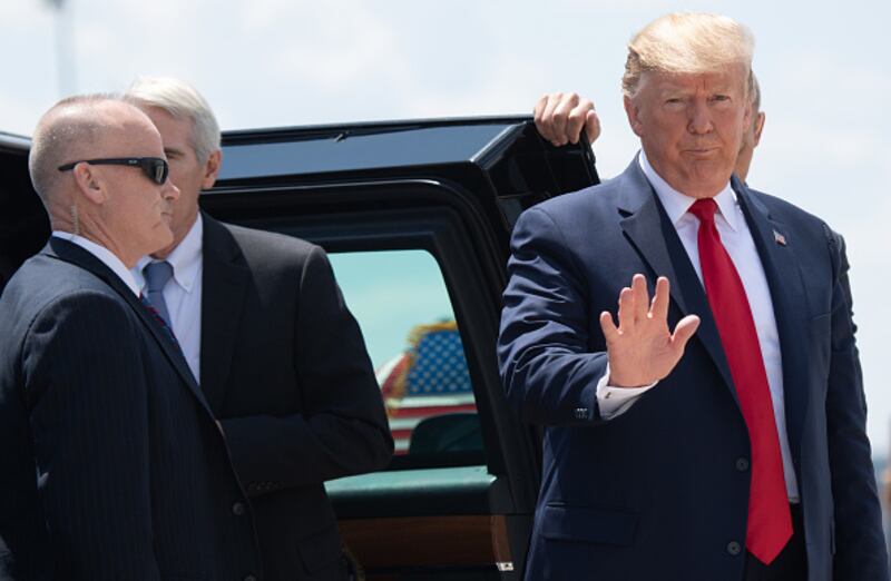 US President Donald Trump arrives to board Air Force One at Wright-Patterson Air Force Base in Ohio on August 7, 2019. - Trump and First Lady Melania Trump met with first responders, hospital staff, victims and their families, following the  August 4 mass shootings in Dayton's popular Oregon District, which left nine people dead. (Photo by SAUL LOEB / AFP)        (Photo credit should read SAUL LOEB/AFP via Getty Images)