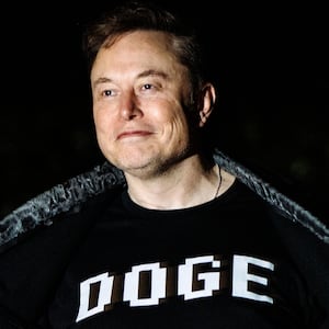 White House Senior Advisor Elon Musk walks to the White House.