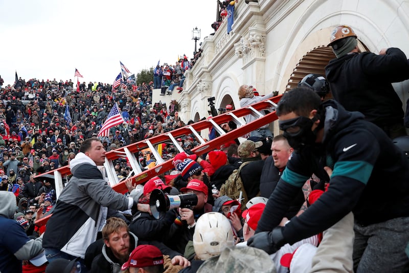 Pro-Trump protesters storm into the U.S. Capitol on Jan 6