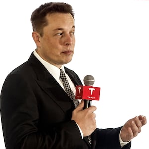 BEIJING, CHINA - OCTOBER 23:  (CHINA OUT) Elon Musk, Chairman, CEO and Product Architect of Tesla Motors, addresses a press conference to declare that the Tesla Motors releases v7.0 System in China on a limited basis for its Model S, which will enable self-driving features such as Autosteer for a select group of beta testers on October 23, 2015 in Beijing, China.